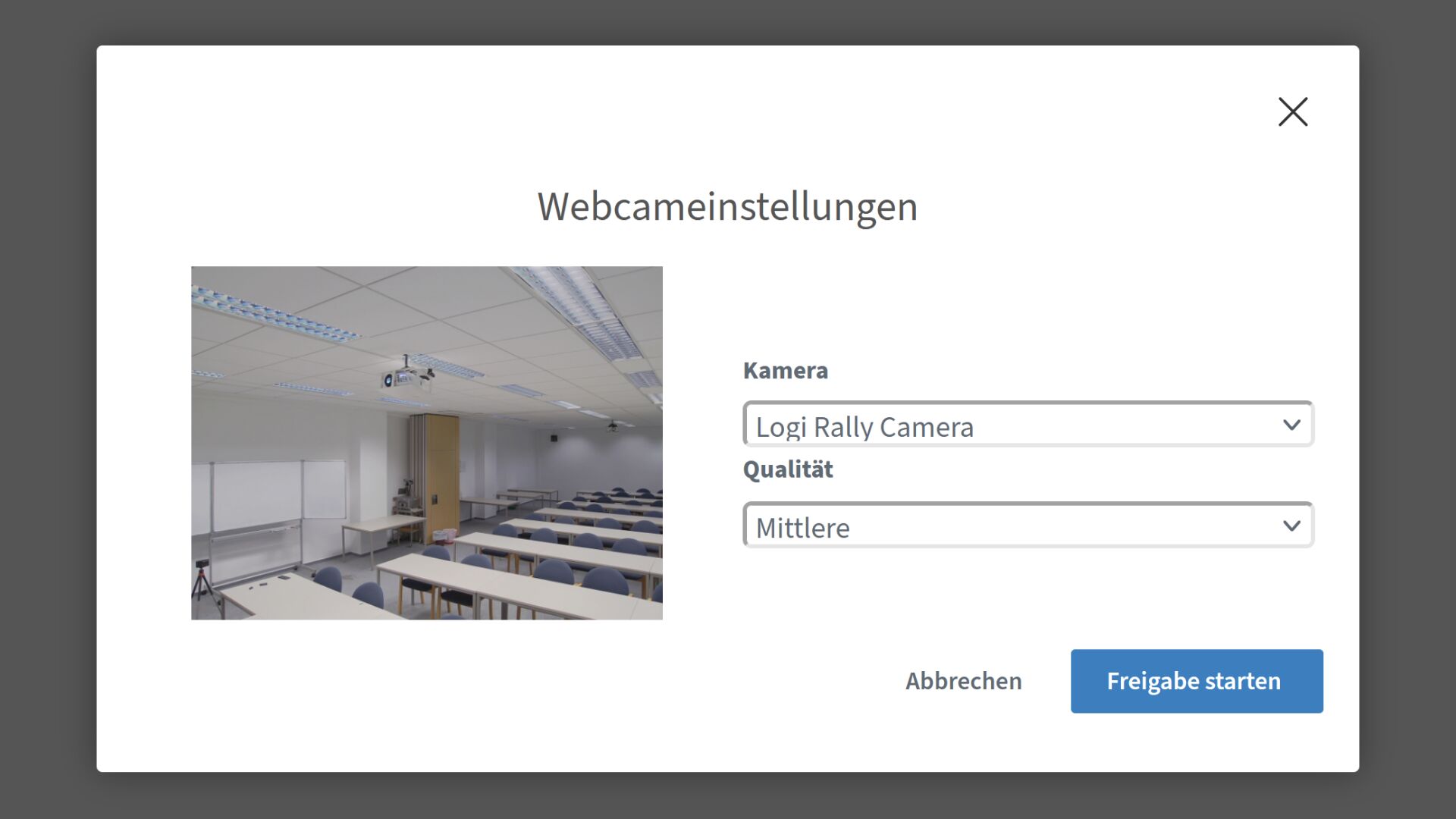 Screenshot des Dialogs 'Webcameinstellungen' in Big Blue Button. Als Kamera ist 'Logi Rally Camera' gewählt, das Bild der Webcam zeigt den Seminarraum.